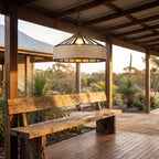 Hemp Rope and Iron Cage Pendant Light above a bench in a covered outdoor area
