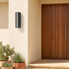 Hollow Rectangle Acrylic Outdoor Wall Light beside a timber front door