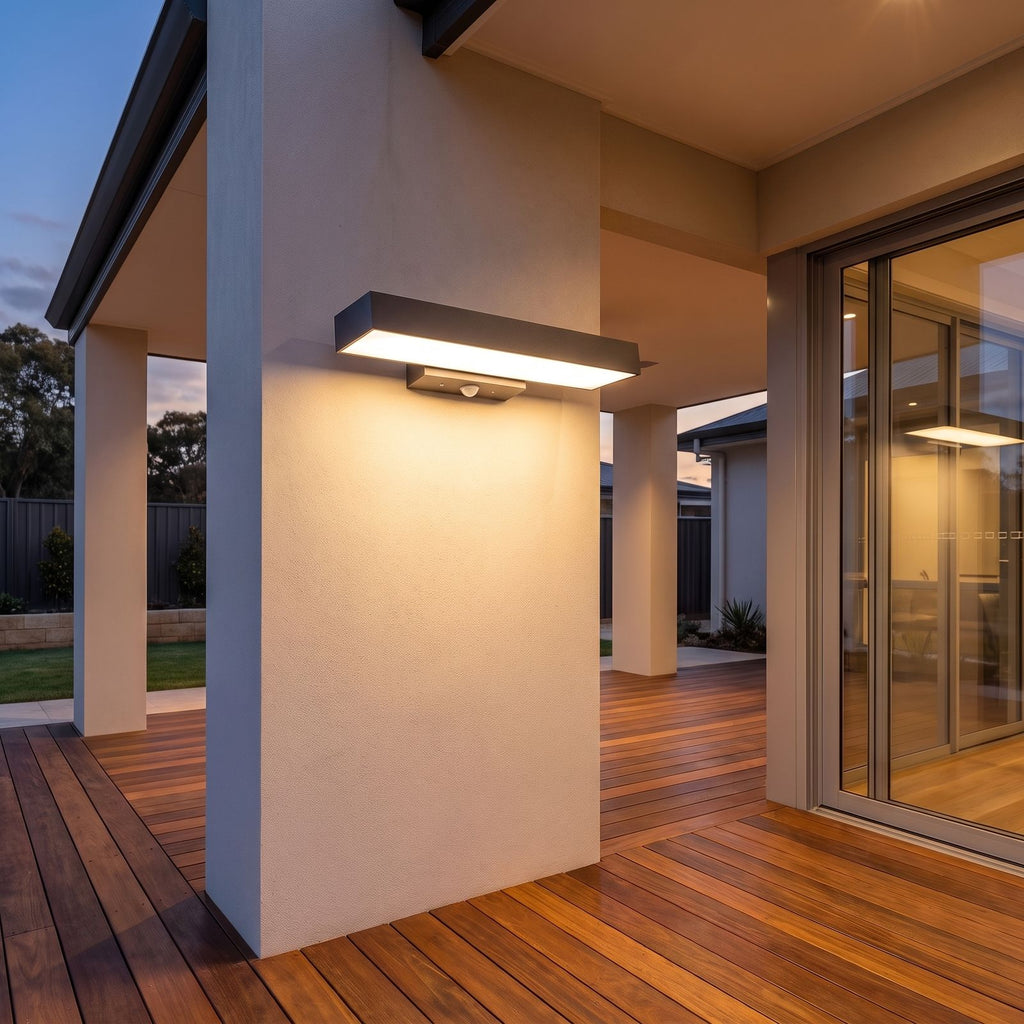 Horizontal flat bar outdoor wall light on a covered alfresco patio wall