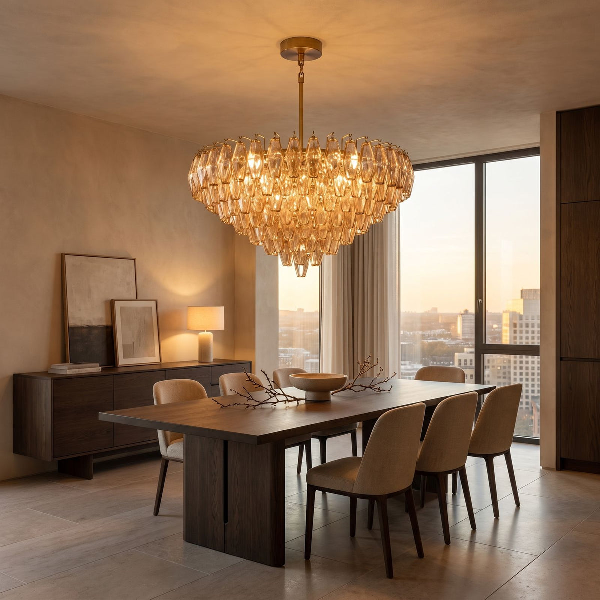 Inverted Dome Faceted Glass Prism Chandelier above a dining table at golden hour