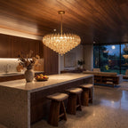 Inverted Dome Faceted Glass Prism Chandelier above a kitchen island at night