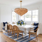 Inverted Dome Faceted Glass Prism Chandelier in a styled bedroom in soft daylight