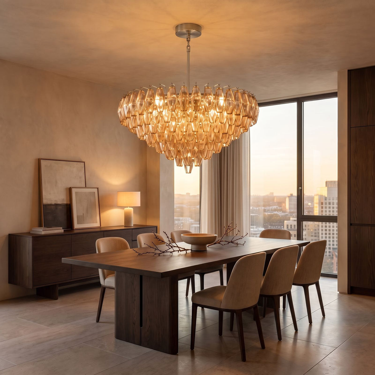 Inverted Dome Faceted Glass Prism Chandelier in satin nickel above a dining table at golden hour