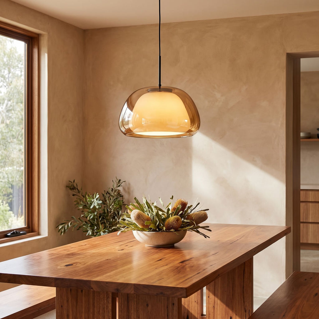 Jelly Glass Dome Pendant Light above a timber dining table