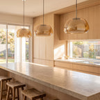 Jelly Glass Dome Pendant Light in a row of three over a stone kitchen bench