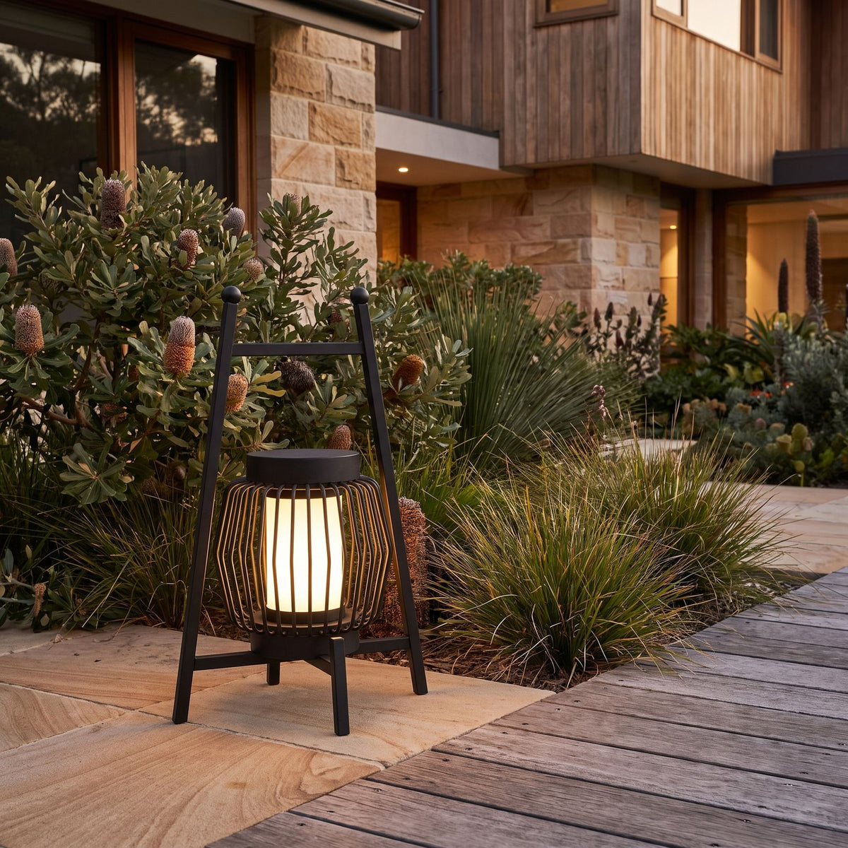 Large Retro Stainless Steel Outdoor Table Lamp on a garden terrace with native plants
