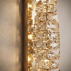 Layered Crystal Ribbon LED Wall Light, close view at 45 degrees on a plaster wall