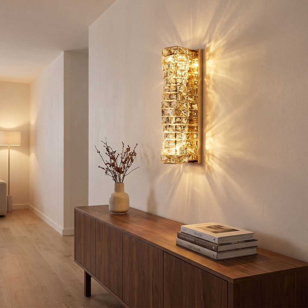 Layered Crystal Ribbon LED Wall Light in a hallway above a timber console