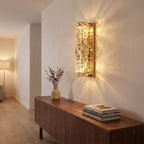 Layered Crystal Ribbon LED Wall Light in a hallway above a timber console