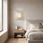Layered Water Ripple Glass Panel Wall Light on a bedroom wall beside the bed