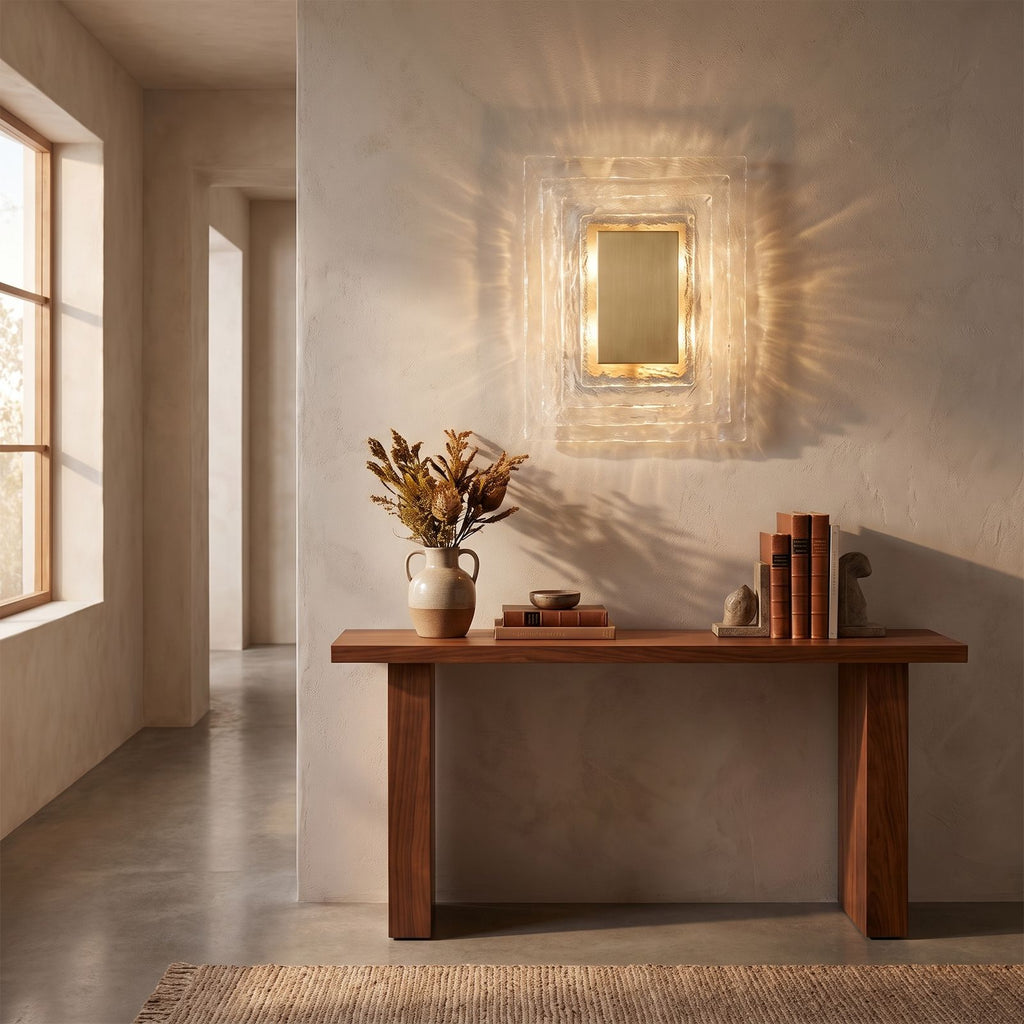 Layered Water Ripple Glass Panel Wall Light in a hallway above a timber console