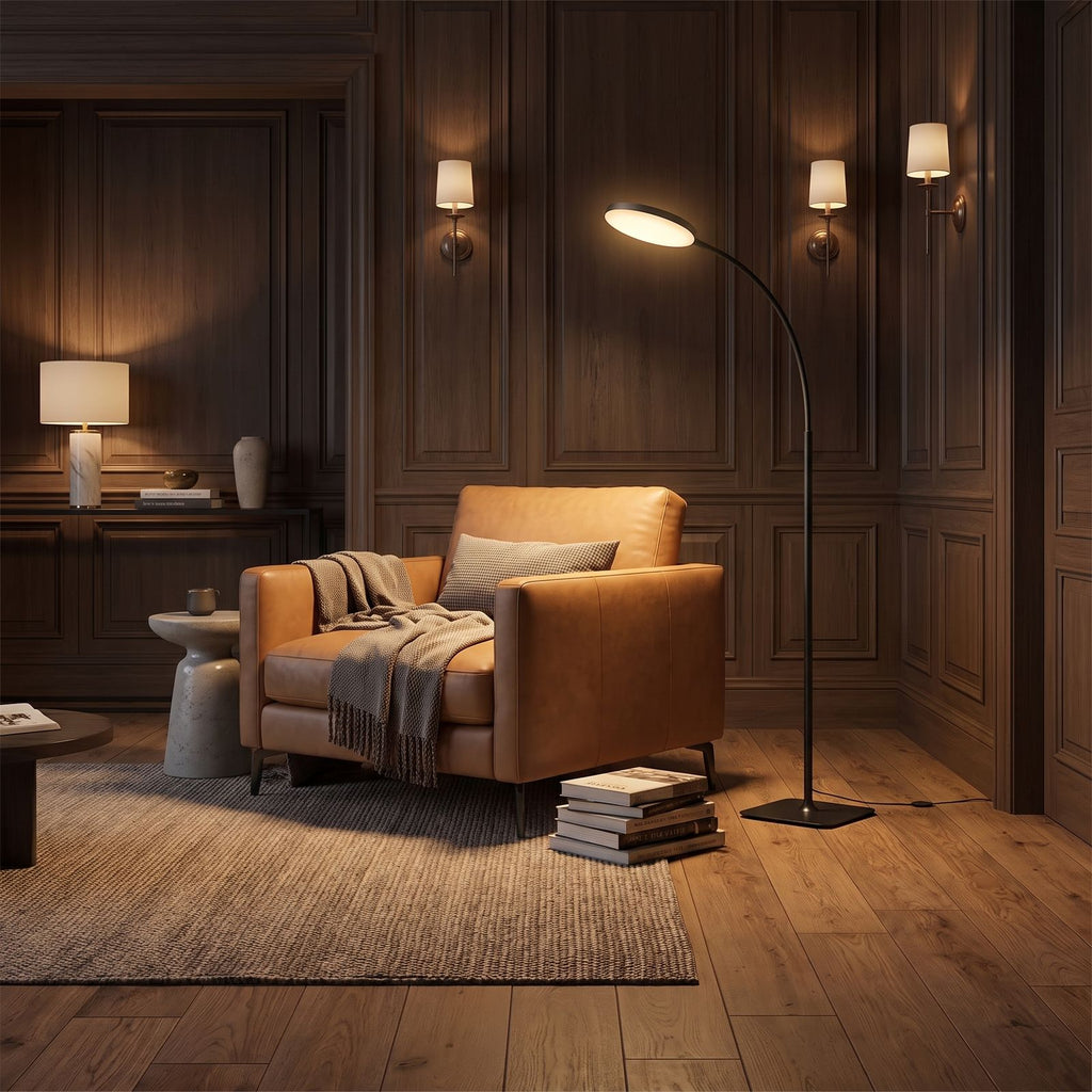LED Gooseneck Reading Floor Lamp behind a leather armchair in a panelled living room in the evening