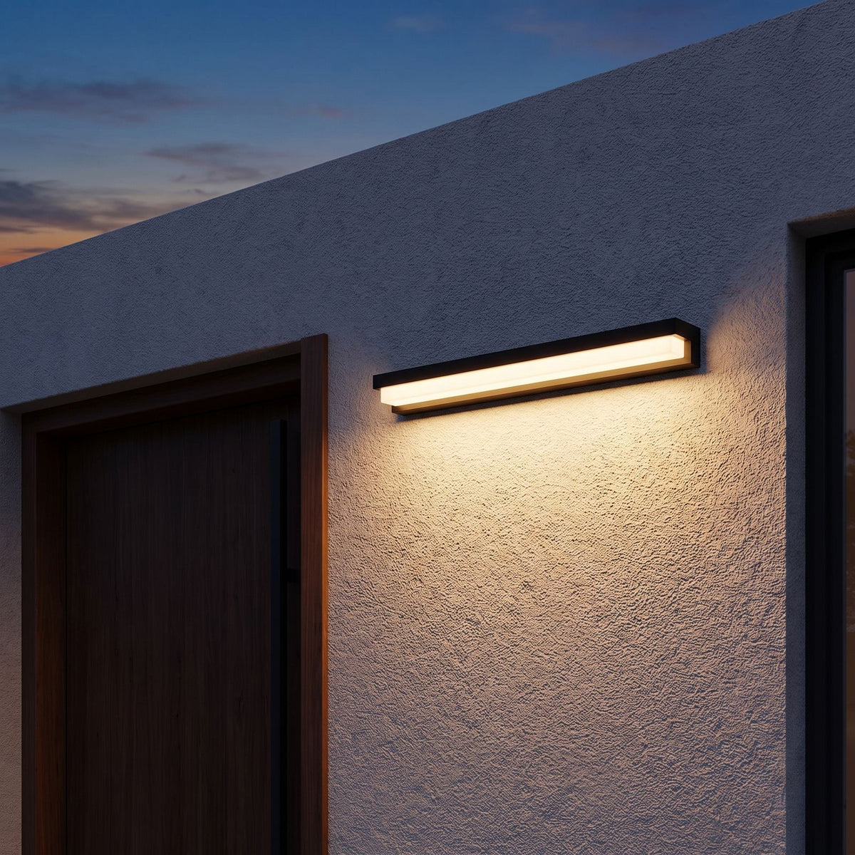 Linear Acrylic Outdoor Wall Light on a porch wall at dusk