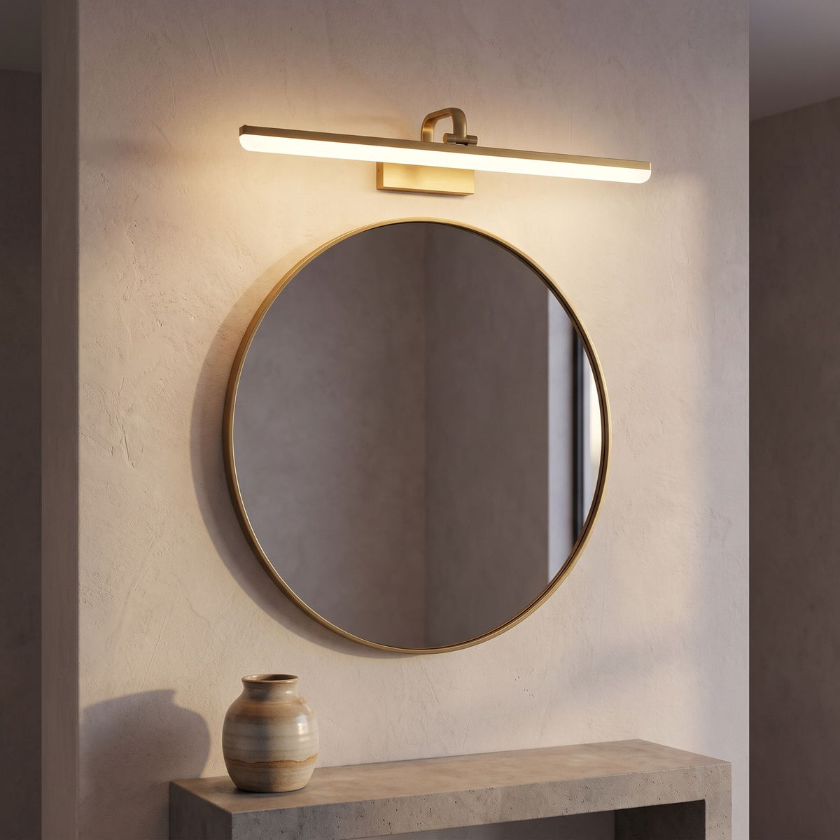 Linear Brushed Brass LED Vanity Wall Light in a styled Australian interior with the light on