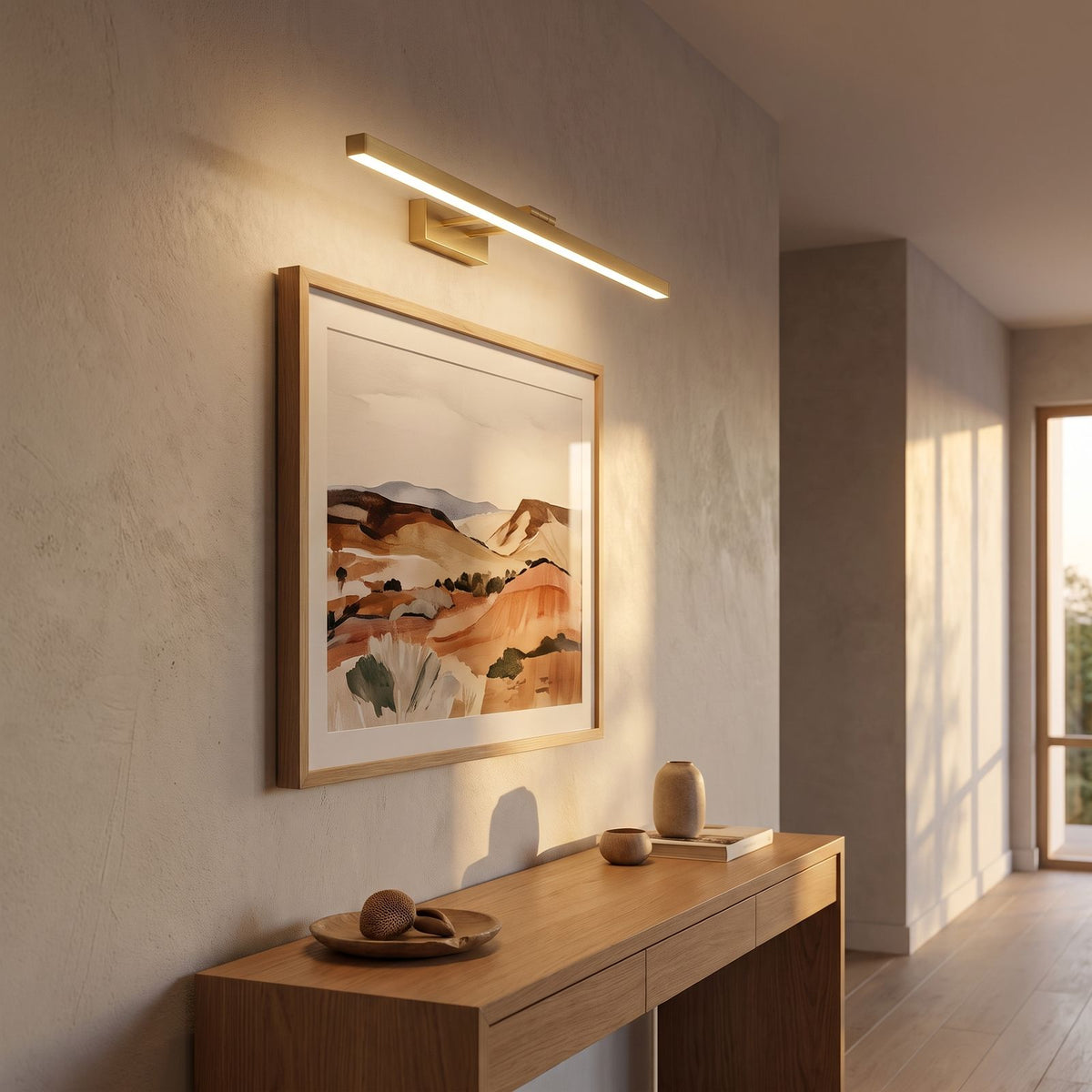 Linear Brushed Brass LED Vanity Wall Light lighting a second setting in an Australian home