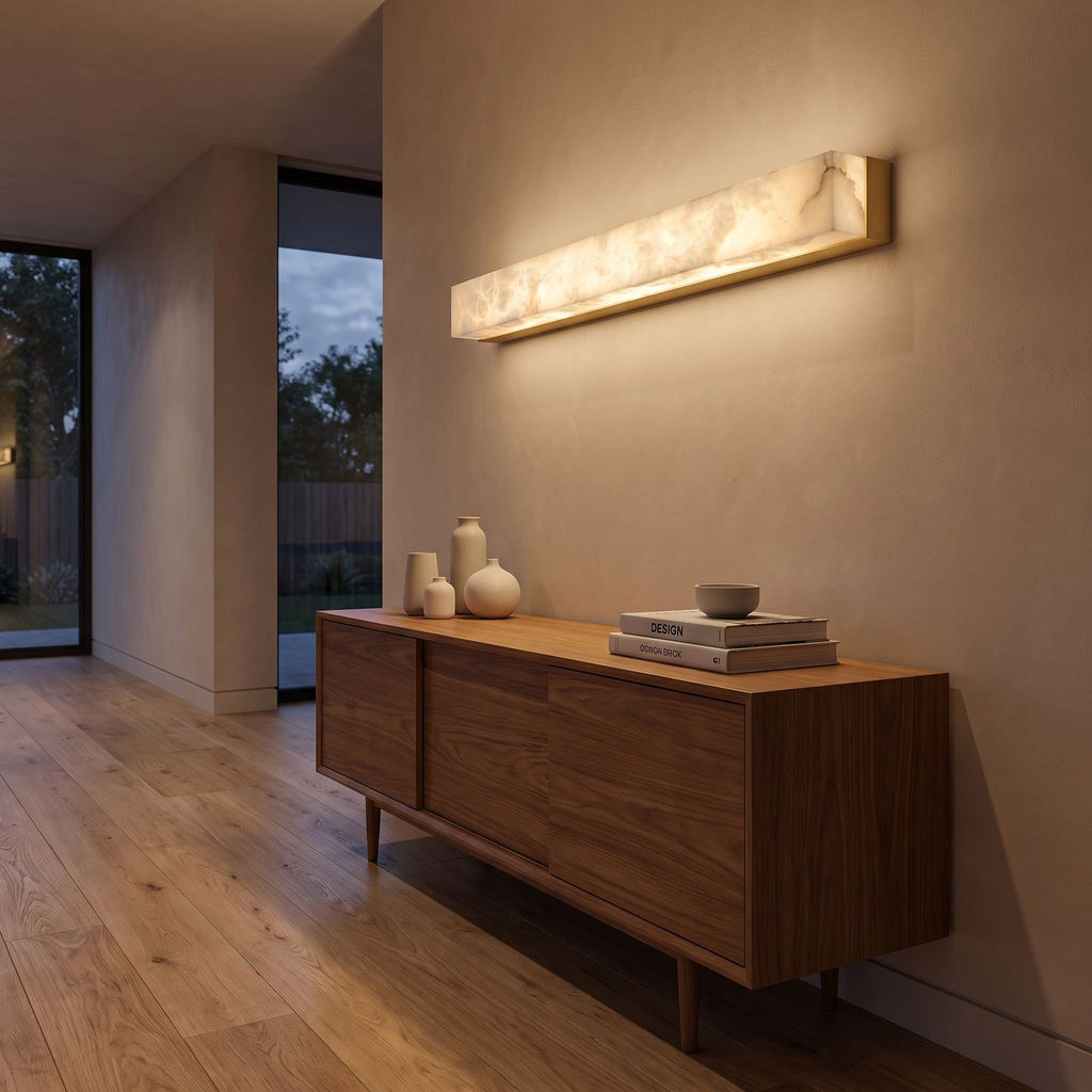 Long Alabaster Bar LED Wall Light in a hallway above a timber console
