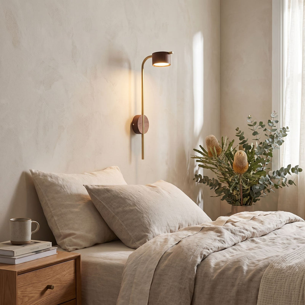 Long Rod Wood Bedside Reading Wall Light on a bedroom wall beside the bed