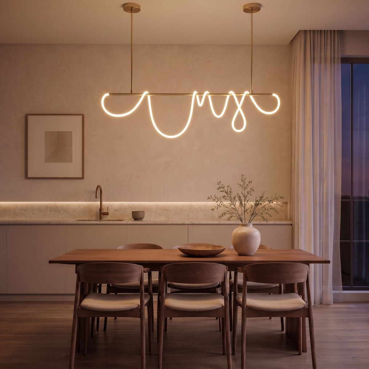 Looped Silicone LED Rope Linear Pendant Light in brass above a dining table