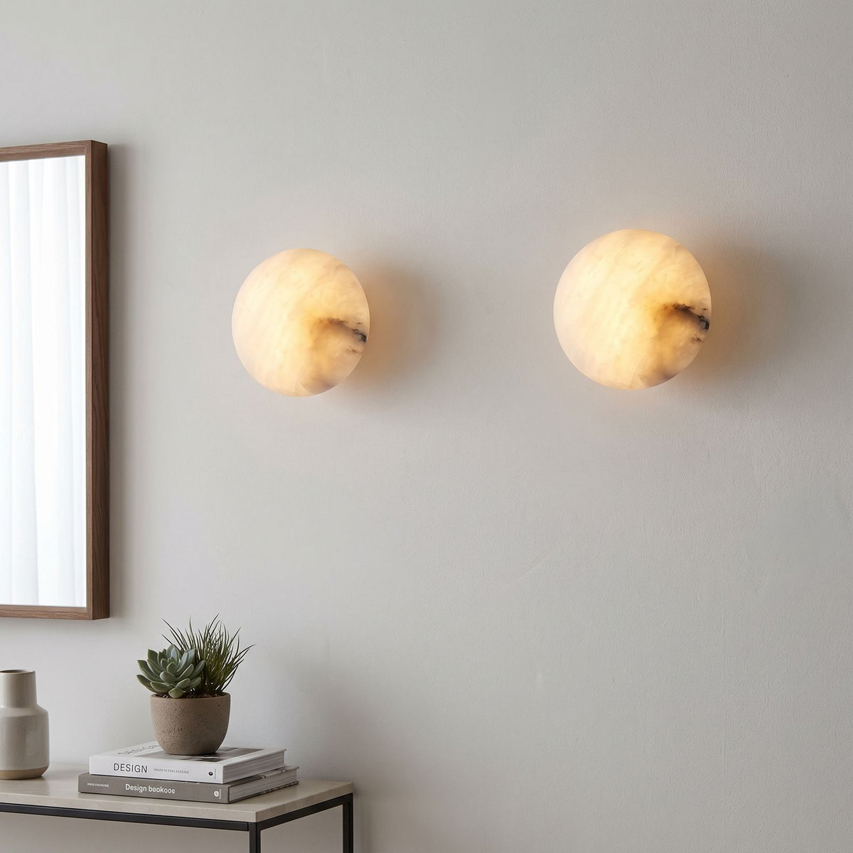 Low-Profile Round Alabaster LED Wall Light in a pair on a wall of an Australian home