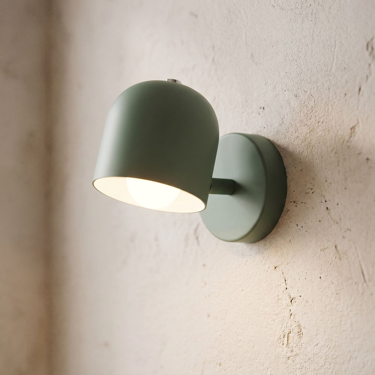 Macaron Glass Flush Wall and Ceiling Light, close view at 45 degrees on a plaster wall