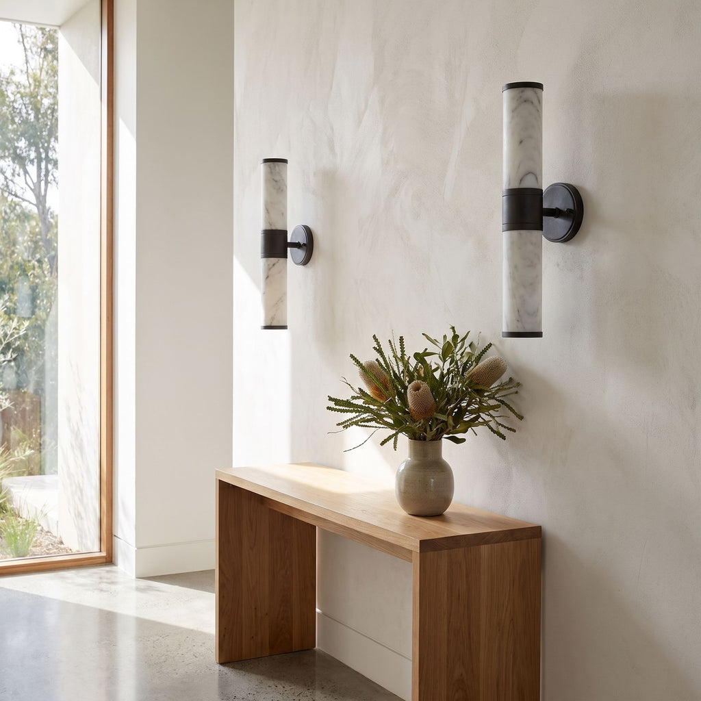 Marble and Cast Iron Up Down Wall Sconce in a pair on a wall of an Australian home