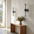 Marble and Cast Iron Up Down Wall Sconce in a pair on a wall of an Australian home
