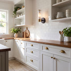 Marble and Cast Iron Up Down Wall Sconce on a kitchen wall