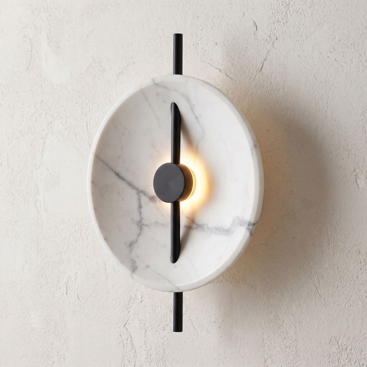 Marble Disc and Black Bar Wall Light, close view at 45 degrees on a plaster wall