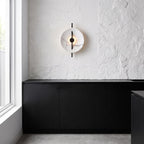 Marble Disc and Black Bar Wall Light on a kitchen wall