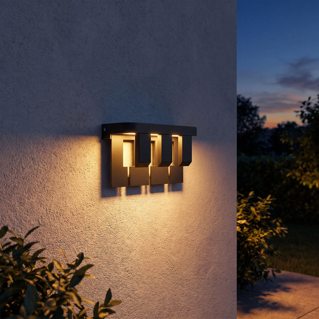 Matte Black Metal Outdoor Wall Light on a porch wall at dusk
