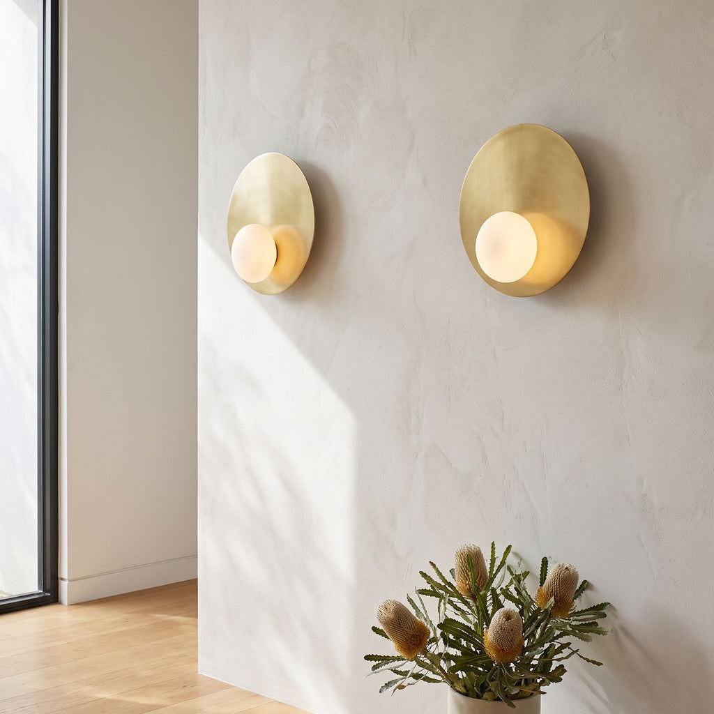 Metal Disc and Opal Glass Wall and Ceiling Light in a pair on a wall of an Australian home