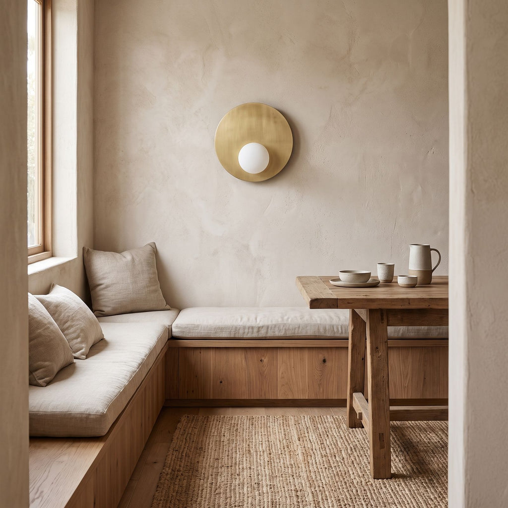 Metal Disc and Opal Glass Wall and Ceiling Light on a dining room wall