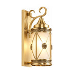 Middle Eastern Style Brass Lantern Outdoor Wall Light on a white background