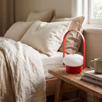 Mini Retro Portable Rechargeable Table Lamp on a bedside table