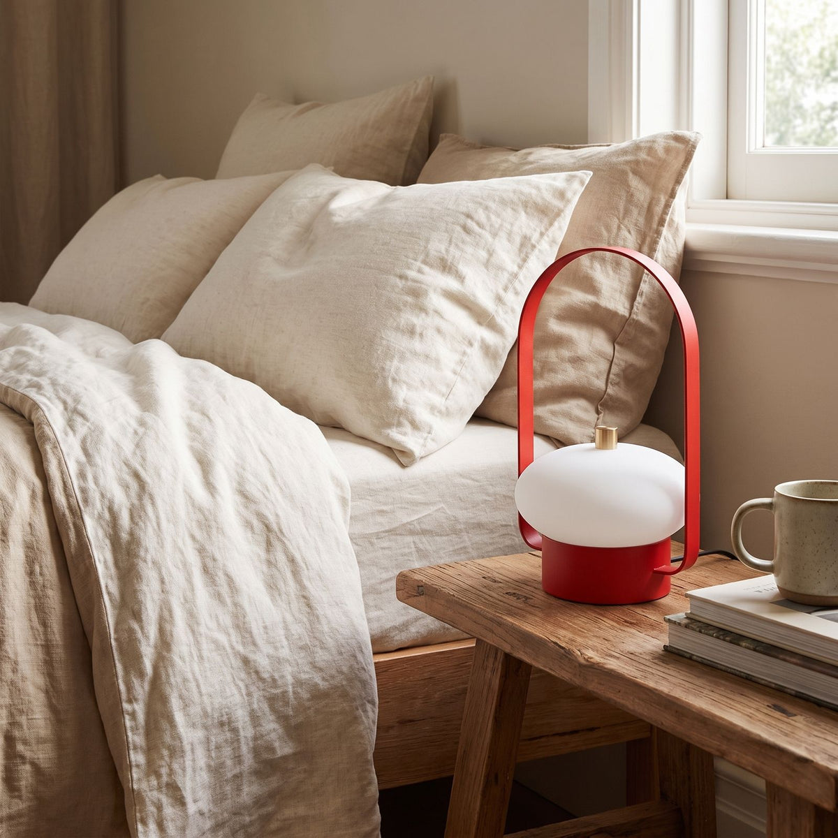 Mini Retro Portable Rechargeable Table Lamp on a bedside table