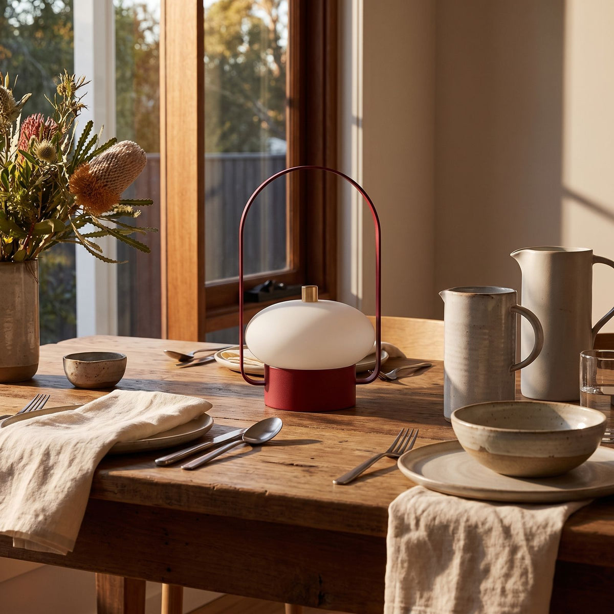 Mini Retro Portable Rechargeable Table Lamp in the centre of a dining table