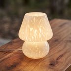 Mushroom Glass Table Lamp, close view on a timber surface