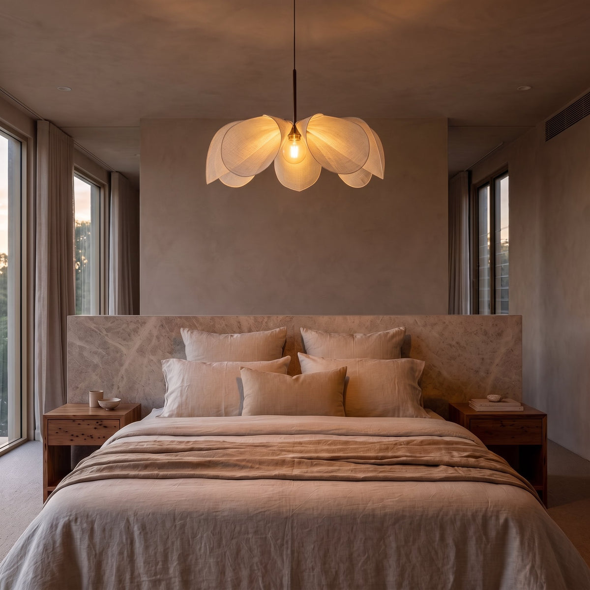 Open Petal Fabric Flower Pendant Light centred above a bed
