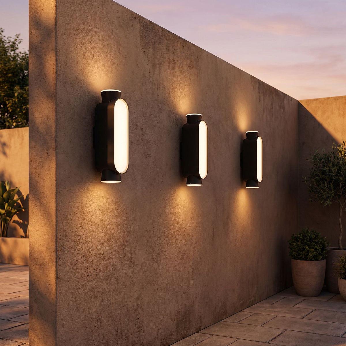 Oval Up Down Acrylic Outdoor Wall Light in a pair on the facade of an Australian home