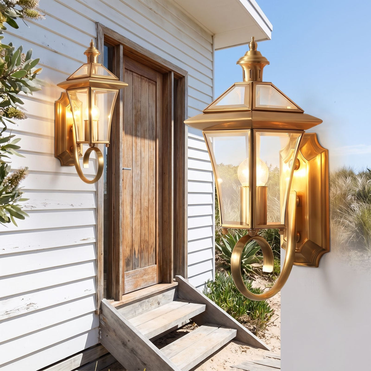 Polished Brass Coastal Outdoor Wall Lantern beside a timber front door