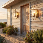 Polished Brass Coastal Outdoor Wall Lantern in a pair either side of an entry door