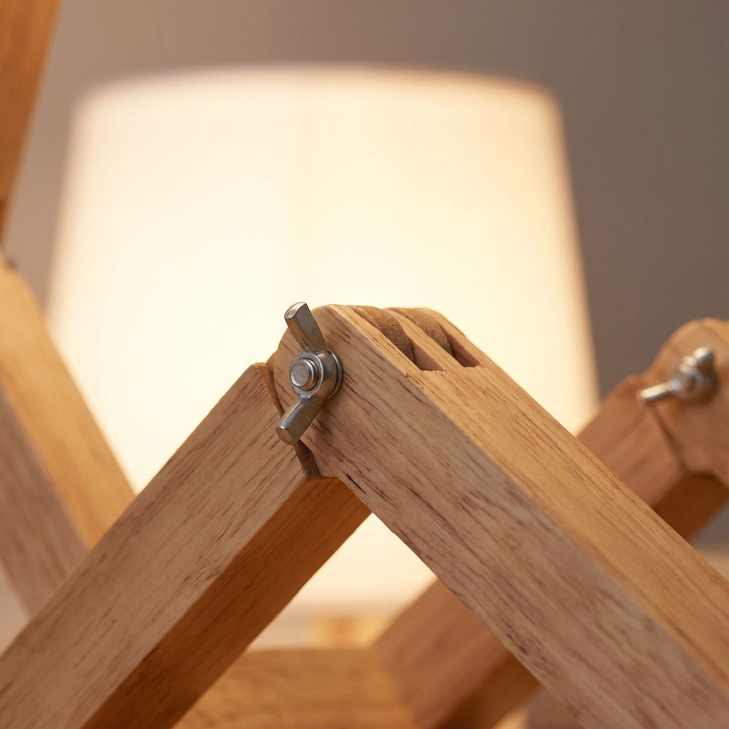 Close-up of the jointed timber leg and wing-nut pivot