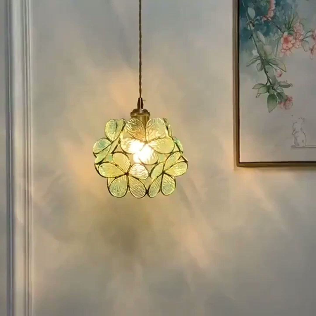 Glass Blossom Cluster Pendant Light lit in green, pink and clear, with a close view of the glass petals