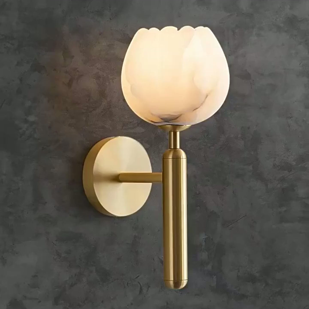 Marble Flower Petal Brass Wall Sconce lit, with close views of the marble petals and a pair beside a bathroom mirror