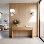 Pumpkin Shade Chrome Wall Sconce in a pair on a wall of an Australian home
