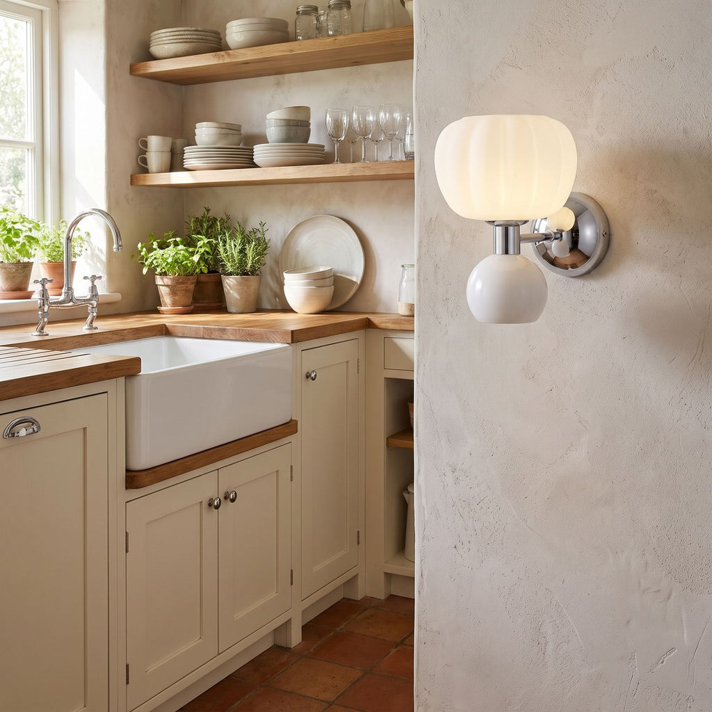 Pumpkin Shade Chrome Wall Sconce on a kitchen wall