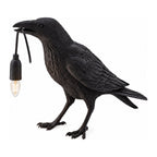Raven Sculpture Resin Table Lamp on a white background
