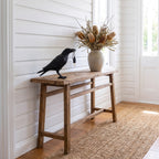 Raven Sculpture Resin Table Lamp on a timber console in an entry hall