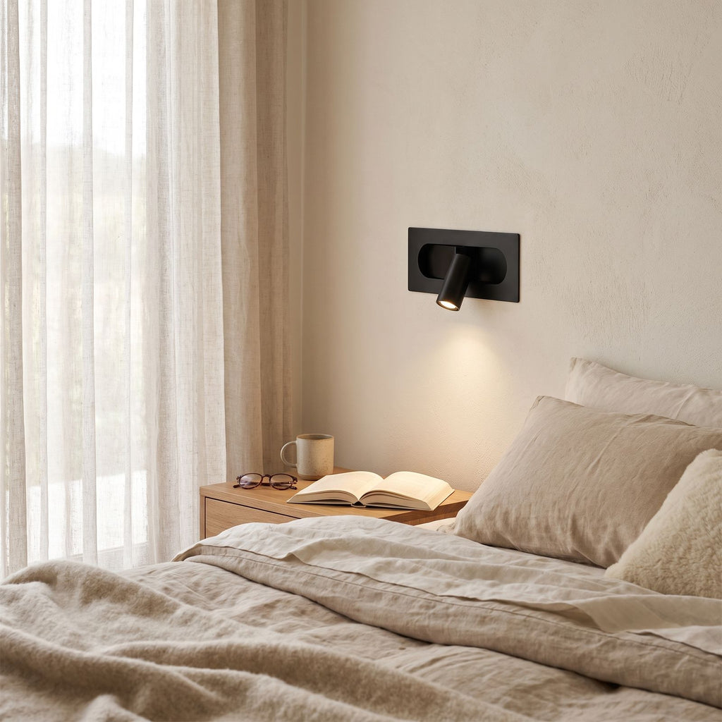 Recessed Pop-Out Bedside Reading Wall Light on a bedroom wall beside the bed