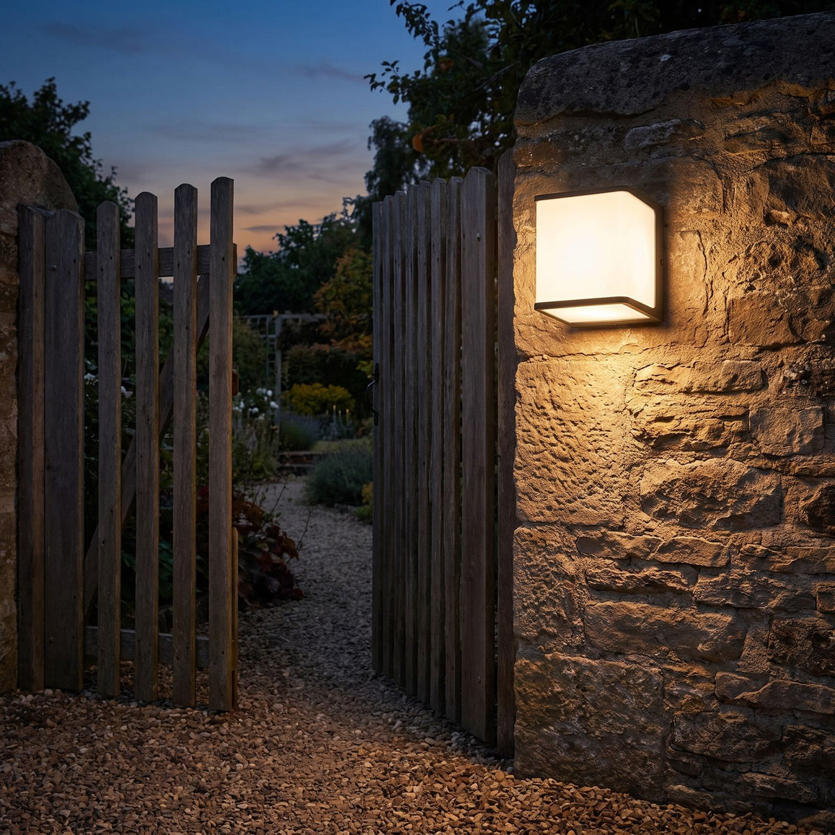 Rectangular Acrylic Solar Outdoor Wall Light on a porch wall at dusk
